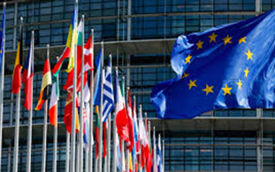 The European Union Flag flies along with the individual country flags of the member nations.