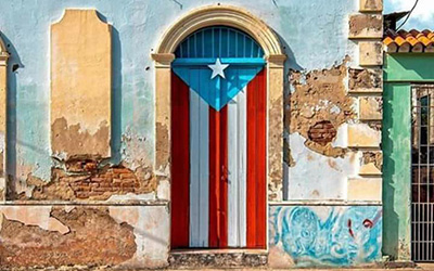 A door painted as the Puerto Rican flag.