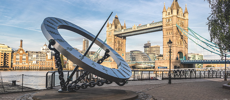 Timepiece sundial by artist Wendy Taylor, with Tower Bridge in the background, London, England