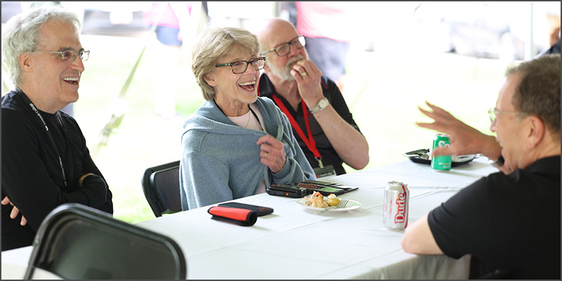 Eric Queen ’74, left, Alumni Award recpient Renee Garrick ’75, and Alumni Counicl member Ken Schofield ’71.
