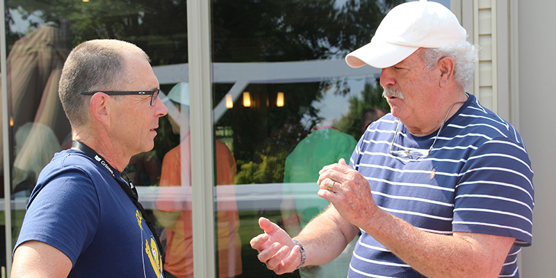 Ivan Lorkovic ’89 talks with his former cross country coach Will Freeman