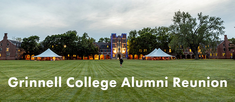 A person walks across Mac Field towards Gates Tower outlined in blue rope lights. Two tents flank the tower to the front. Text: Grinnell College Alumni Reunion