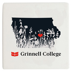 A black shape of Iowa with white prairie grasses and flowers silhouetted against the state. A red heart is placed where Grinnell is located in the state. 