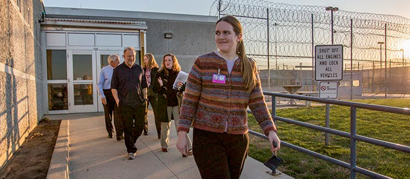 Emily Guenther ’07 walks out of an Iowa Prison