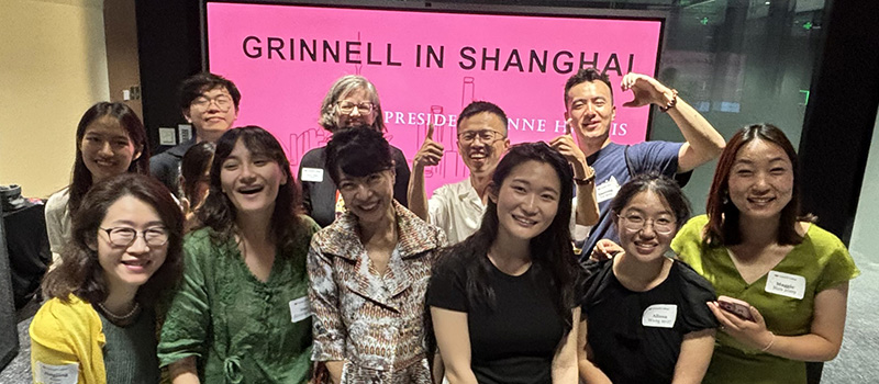 President Anne F. Harris is pictured with attendees during a 2024 event in Shanghai, China.