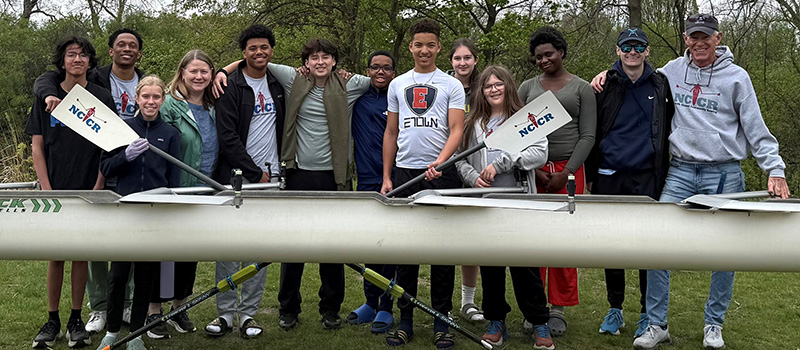 Elizabeth Powley &rsquo;93, fourth from left, is pictured with middle school students in the North Channel Community Rowing program.