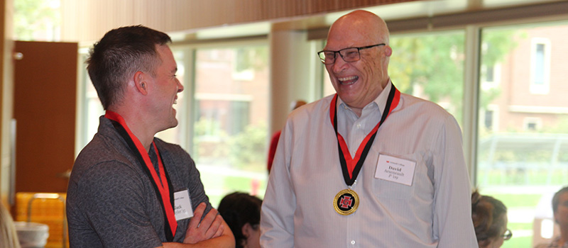 Jack Taylor &rsquo;15, left, and his former basketball coach, David Arseneault