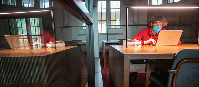 A student studies in the new Reading Room on the third floor of Alumni Recitation Hall.