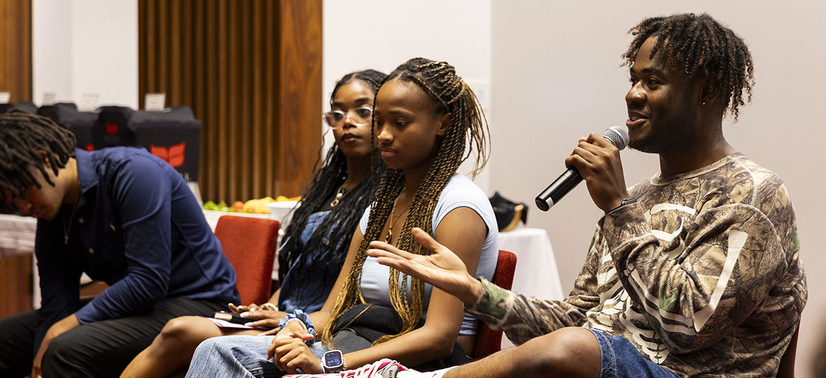 Quincy Peterson ’27 speaks as part of the student panel. 