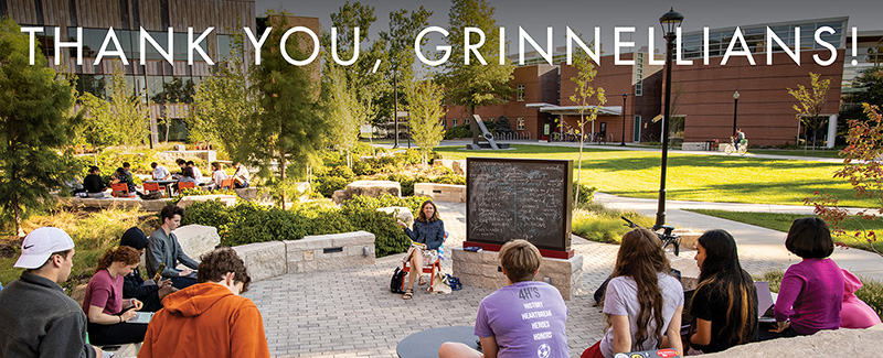 A class is being taught outside in the learning grove outside the HSSC. Text: Thank you Grinnellians!