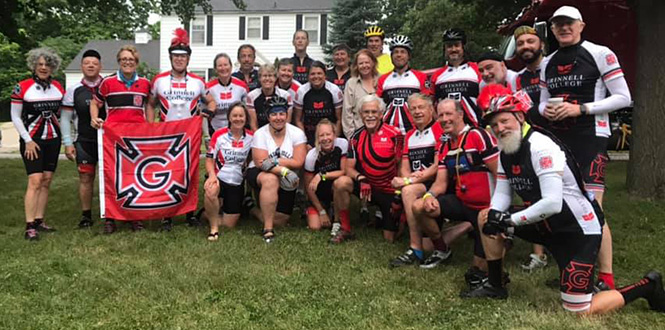 Team Grinnell riders gather for a team photo before hitting the bikes during jersey day on Friday.  
