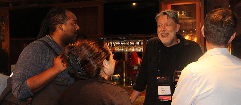 Rick Rose chats with fellow alumni at the Multicultural Reunion Welcome Reception