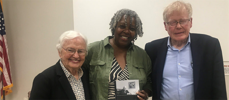Emily Pfitsch (left), Irma McClaurin ’73, and George Drake ’56 take a photo at Drake’s 2019 book signing.