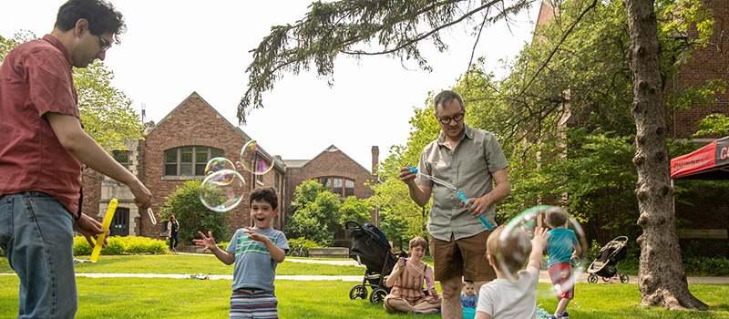 Families enjoy playing with bubbles during Reunion 2019