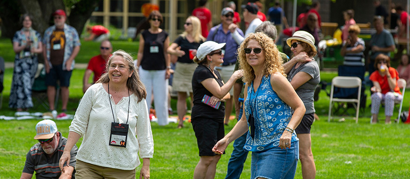 2019 Reunion attendees listen to live music during a Chill Time event on Central Campus.