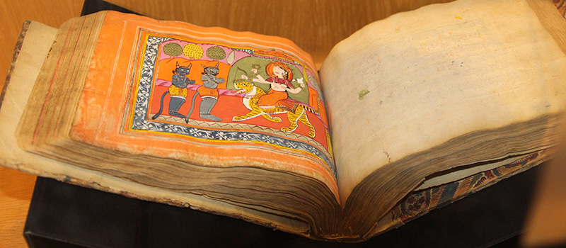 1800 Mughal-Era manuscript came from North India. The gods Manasa, Durga, and Kali are dramatically depicted in vibrant orange, yellow, rose, and blue backgrounds.