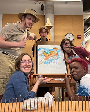Yoshi Ascencio &rsquo;27 displays artwork alongside fellow students in a Bucksbaum Arts Center studio.