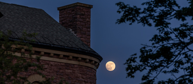 Full moon over the campus of Grinnell College.