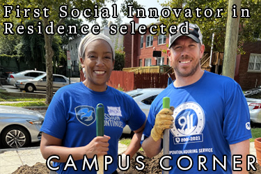 Text: Campus Corner - First Social Innovator in Residence selected. Image: Monica Sanders and another volunteer pose for a picture holding shovels.
