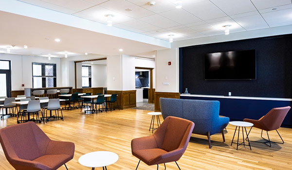 The updated Loose Hall lounge featuring increased lighting and new furniture. 