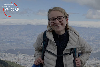 Elizabeth Collinger ’21 stand in front of mountains in South America.