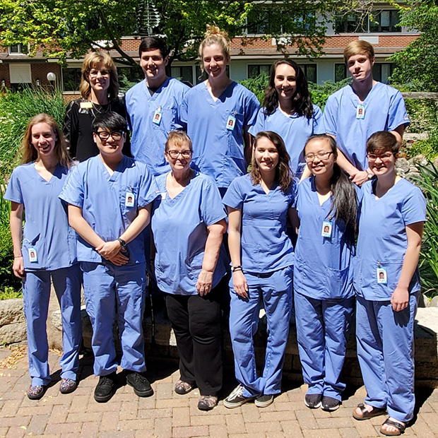 Health professions career community students take a group shot following certified nursing assistant training at the Mayflower Community in Grinnell. 