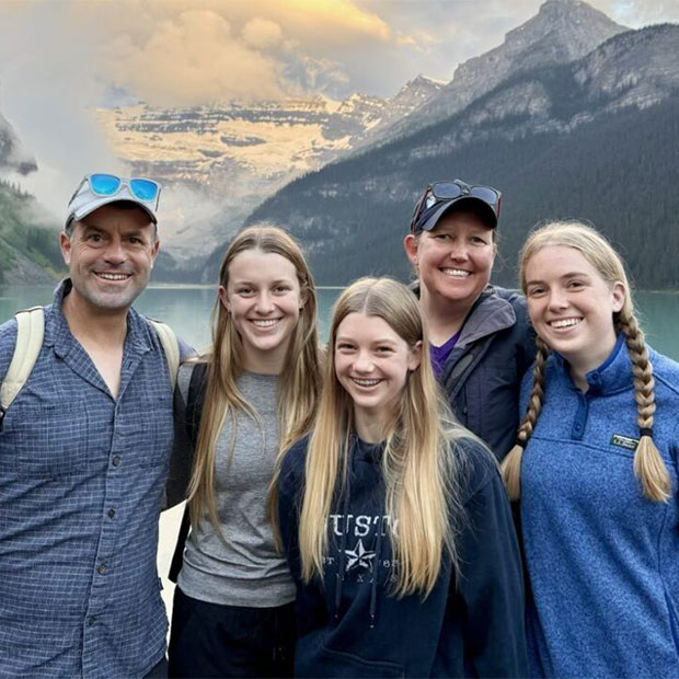Dan, left, Maddie, Alex, Camarin, and Genevieve Madigan pose for a photo at Lake.