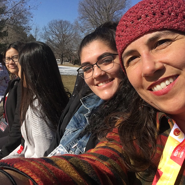 Kristin Stuchis '98 with several Latinx students she works with in Marshalltown, Iowa.