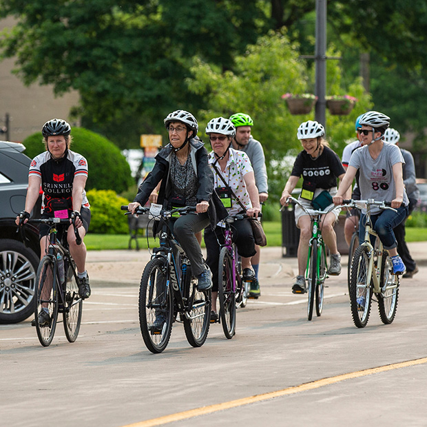 Reunion attendees in 2019 enjoy a bike ride around town.